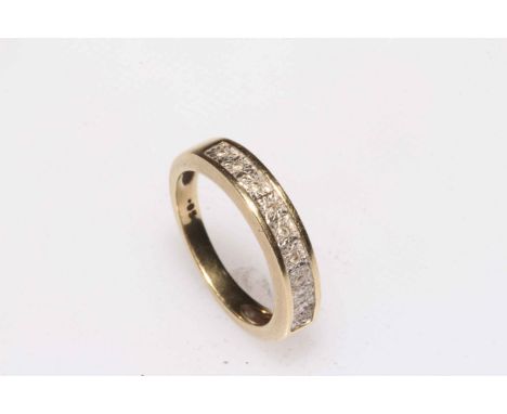 Diamond set 9 carat gold half eternity ring, size K.