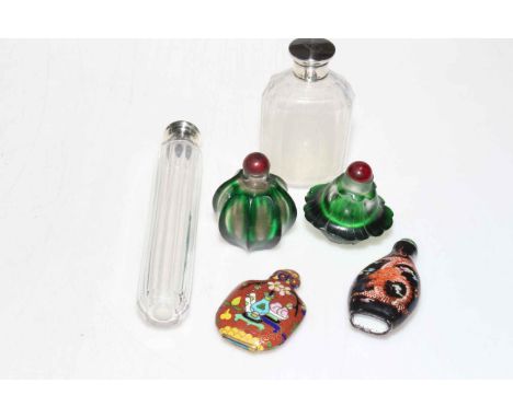 Four Chinese glass and enamel snuff bottles, and two silver topped toilet bottles (6).