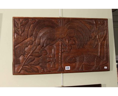 Haitian carved folk art hardwood panel, 36cm by 64cm.