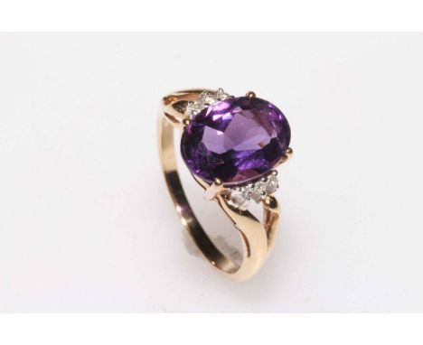 9k Amethyst and diamond ring, size P.