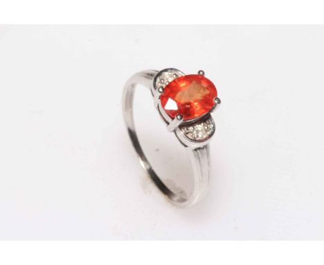 9k Orange Sapphire and diamond ring, size P.