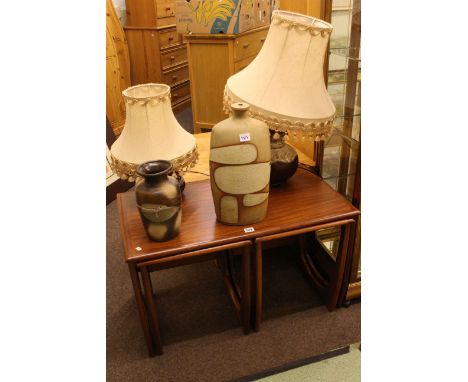 Rectangular nest of three teak tables, two pottery table lamps and shades, lamp base and West German vase (5).