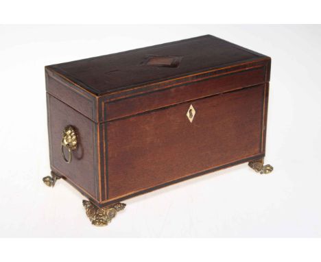 Inlaid mahogany two compartment caddy on brass feet.