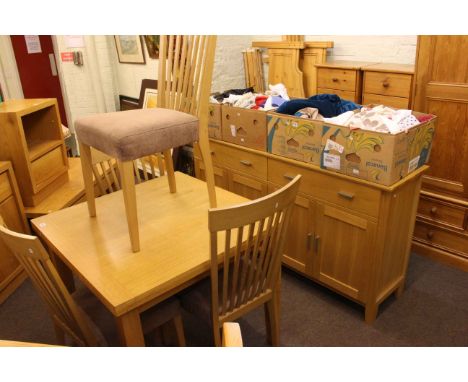Morris Furniture six piece light wood dining suite comprising four door sideboard, fold top dining table and four rail back d