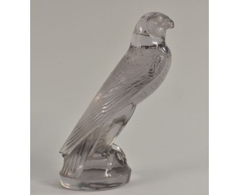 A Lalique Falcon car mascot, Faucon, amethyst tinted, moulded R Lalique mark, engraved France, 15.5cm Condition Report: Tail 