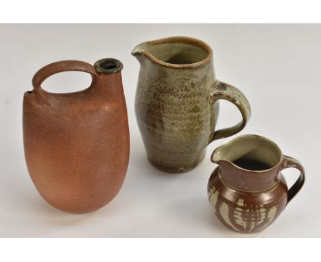 Studio Pottery - St. Ives School - a Leach Pottery ribbed baluster shaped water jug, impressed monogram; a Muchelney Pottery 