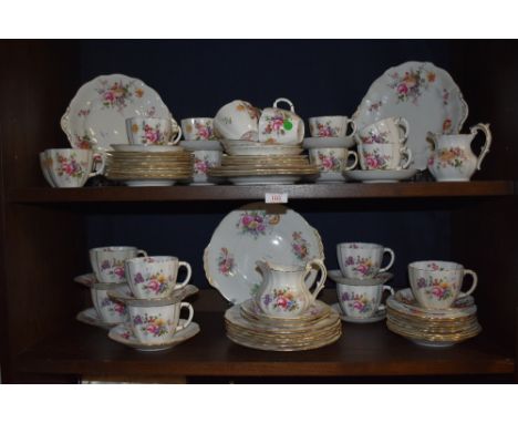 A large part tea and dinner service by Royal Crown Derby in the Derby Posies design