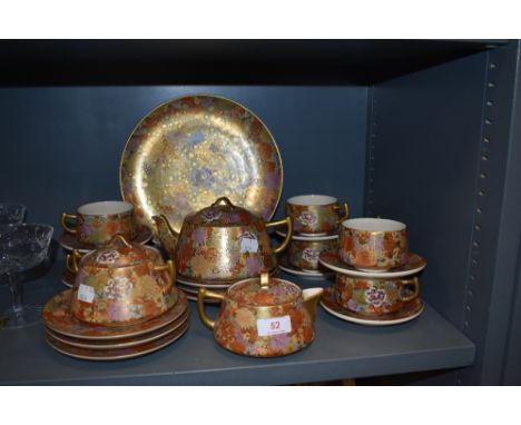 An impressive Japanese part tea service in a traditional Satsuma ware with millefiori thousand flowers design