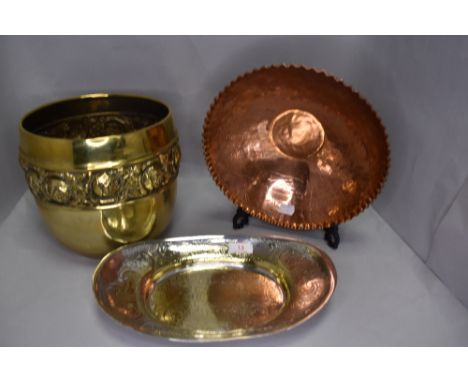 A selection of metal wares including copper African bowl and brass embossed planter