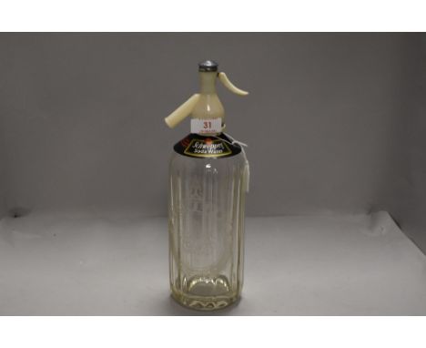 A vintage soda syphon for Schweppes