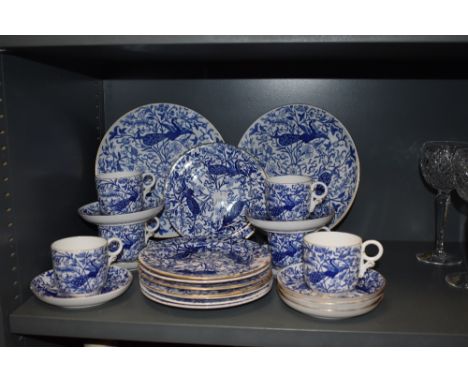 A part tea service by Royal Crown Derby in chintz style design