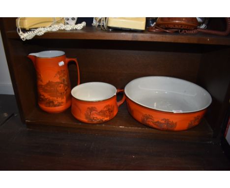 A large wash jug and bowl set in a red glaze transfer print by Adams and son