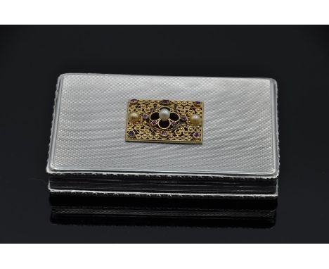 Continental sterling silver box rectangular in form , engine turned decoration to exterior with raised and decorated margins,