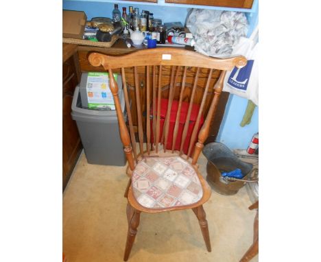 2 modern stick back chairs