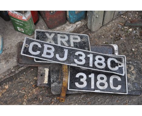 Various vintage number plates including steam engine plates 