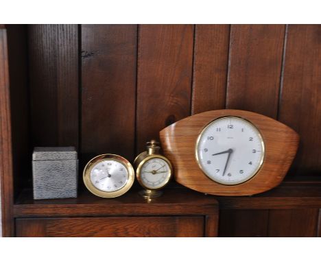 4 clocks incl 3 travelling alarm clocks and a Smiths mantle clock