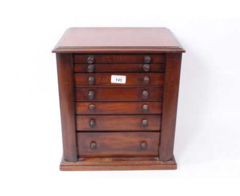 Collectors Cabinet - a dark wood stained early 20th century seven drawer cabinet. Ideal storage for coins or other small coll