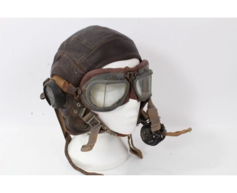 Early post Second World War RAF leather C Type leather flying helmet, together with two pairs of flight goggles and a radio m