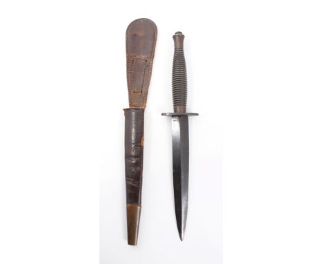 Second World War British third pattern F.S. Commando knife with broad arrow and ' I ' marks to cross guard retaining much ori