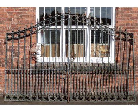 Pair of large galvanised galtes, each gate with prancing horse motif, when closed art 310cm wide and 230cm tall approximately
