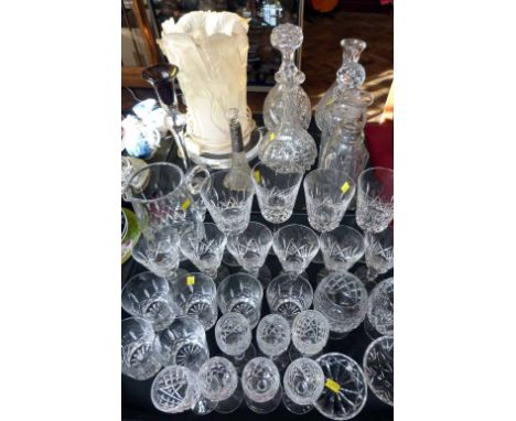 Approximately 30 various cut glasses, decanters, water jug and resin lalique style table lamp. Condition report: see terms an