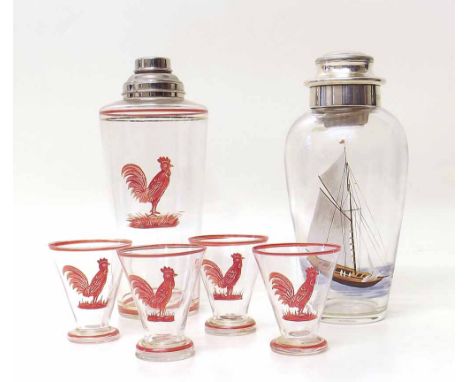 Art Deco enamelled decanter and four glasses and one other shaker enamelled with a yacht. Condition report: see terms and con