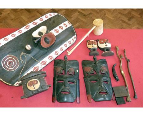 Collection of African items to include a sheild, two masks, bag, two figures, two elongated figures, a single string harp and