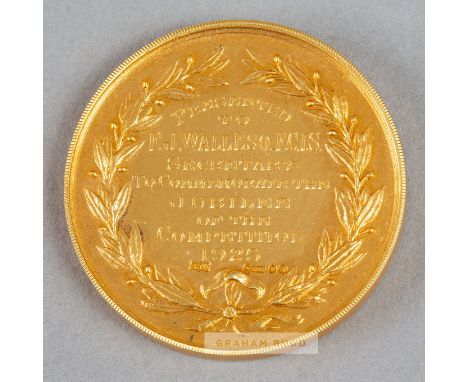 F.A Cup Golden Jubilee Medal awarded to the Football Association's Secretary Sir Frederick Wall in 1925,obverse with the FA t