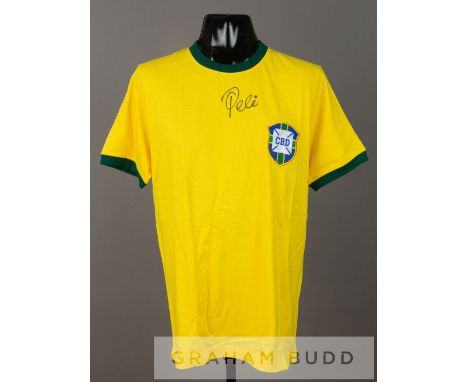 Pele signed yellow Brazil retro jersey, short-sleeved with green collar and C.B.D crest, signed PELE in black marker pen, siz