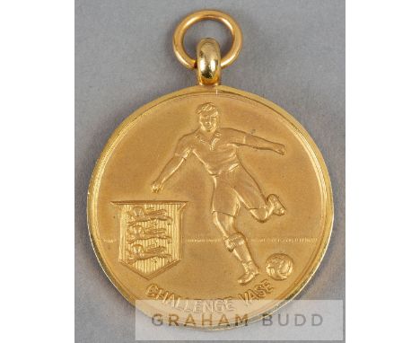 1976 F.A. Challenge Vase runners-up medal,9ct. gold, Birmingham,1975-76, by Fattorini & Sons, obverse with a footballer kicki