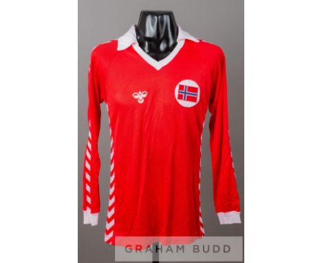 Red and white Norway no.7 jersey, circa 1983, by Hummel, long-sleeved with embroidered country badge and sponsor logo, revers