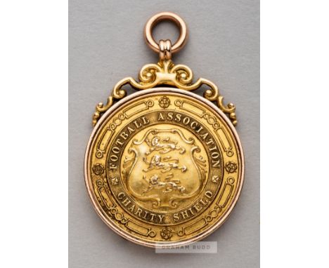 Football Association Charity Shield Winner's medal awarded to Newcastle United's Frank Watt in 1909,obverse inscribed FOOTBAL