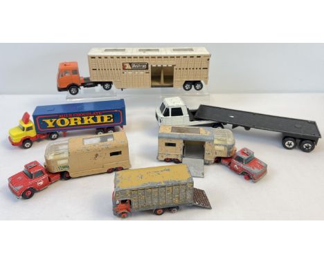 A collection go vintage diecast lorries and animal transporters. To include a horse/cattle box by Budgie Toys, 2 x Matchbox K