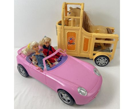 A Barbie horse trailer with horse together with 2 barbie dolls &amp; a Thinking Toy convertible sports car (a/f). Horse box a