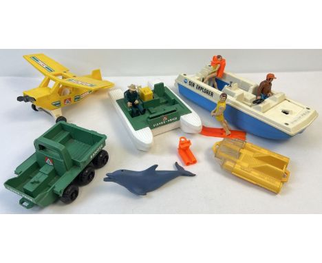 A collection of vintage Fisher Price land, air and sea vehicles with some figures and accessories. To include Sea Explorer bo