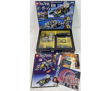 A boxed Lego Technic set 8456 with instruction manual and interior tray. Comes with Lego Technic catalogue, 9V motor instruct