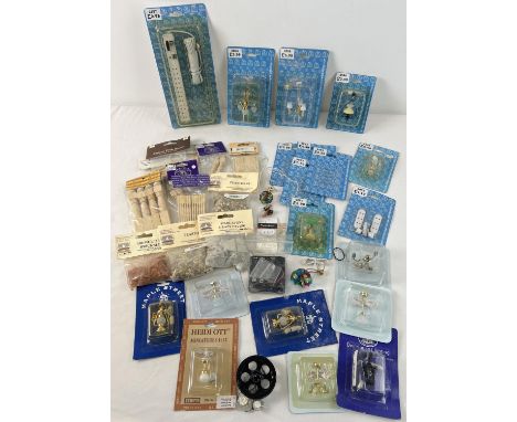 A quantity of new in original packaging dolls house lights, lighting accessories, wooden bannisters and various paving and sh