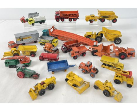 A collection of vintage Matchbox construction vehicles, lorries and trucks. In play worn condition, in various scales. 