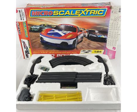A boxed Micro Scalextric Turbo Power electronic racing set with 1 car (2 cars missing). 