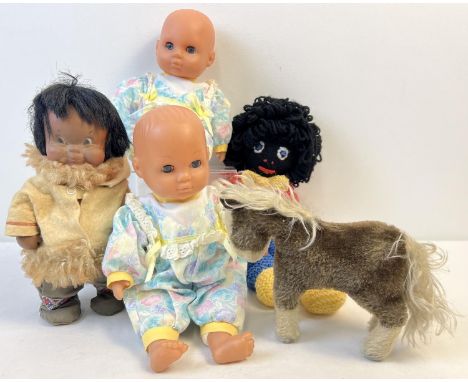 A collection of vintage soft toys and dolls to include Steiff. Lot includes Canadian Inuit doll by Regal and "Ferdy" horse by