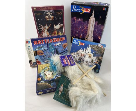 A collection of assorted toys, games &amp; puzzles. To include 2 x 3D puzzles from MB, sealed Freddie Mercury 'Legends' puzzl