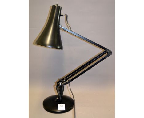 A modern Angle poise lamp