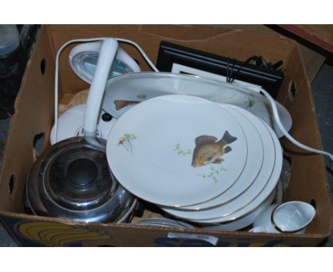 A magnified lamp, digital picture frame, ice bucket and ceramics. 
