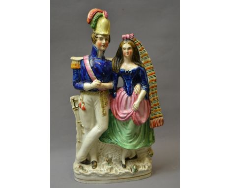 A Victorian Staffordshire flat-back figural group. Approximately 32 cm tall. CONDITION REPORT; Generally good order throughou