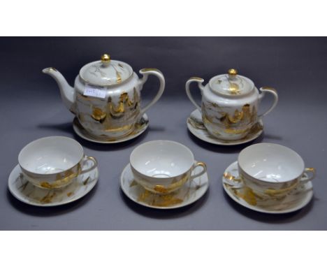 An Oriental tea service of fourteen pieces