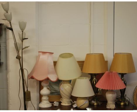 A selection of lamps and shades and a standard lamp