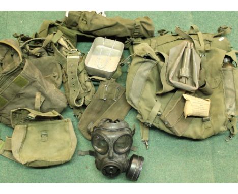 Selection of c1970s British Armysmg magazine pouch webbing and accessories to include Mess tins, water bottles, folding entre