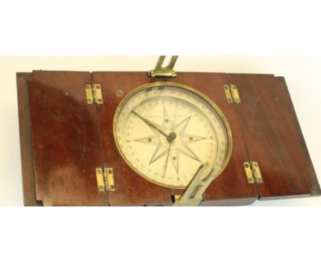 C19th Miners surveying compass in hinged fold over mahogany case, brass sights and silvered dial, dial etched for G. Davis of