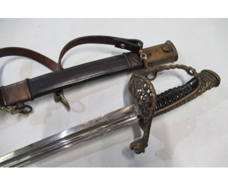 C19th French naval officers sword, 27 1/2" slightly curved twin fullered blade stamped star above G B, back strap inscribed C