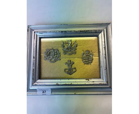 Two framed and mounted display of various Australian military cap badges, mostly staybrite, including Royal Australian Regime